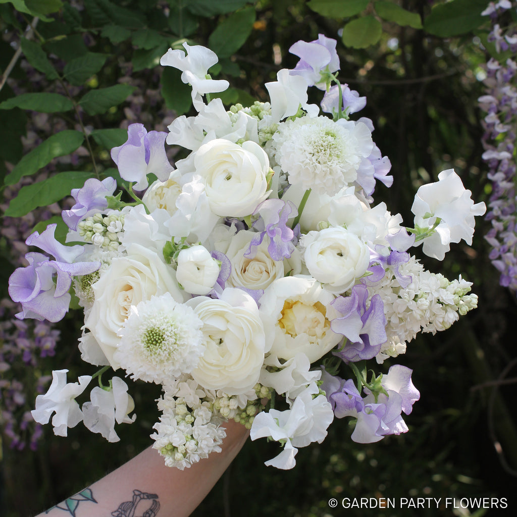 spring bridal bouquet designed by vancouver florist at garden party flowers